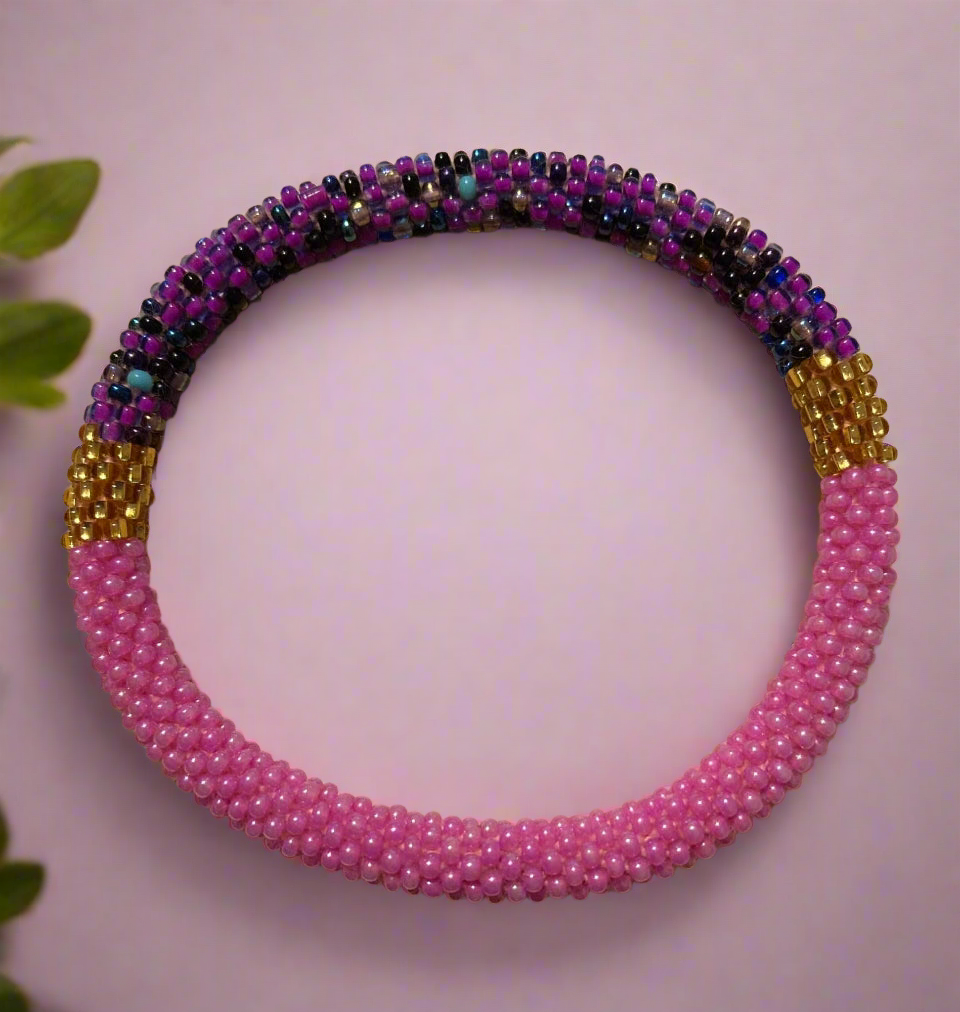 Bracelet Handmade crocheted glass beads size 7.5” pink purple and gold