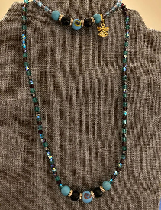 Bead necklace and bracelet set with angel